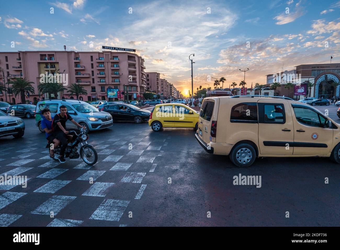 Traffic at a busy junction in Marrakech, Morocco Stock Photo