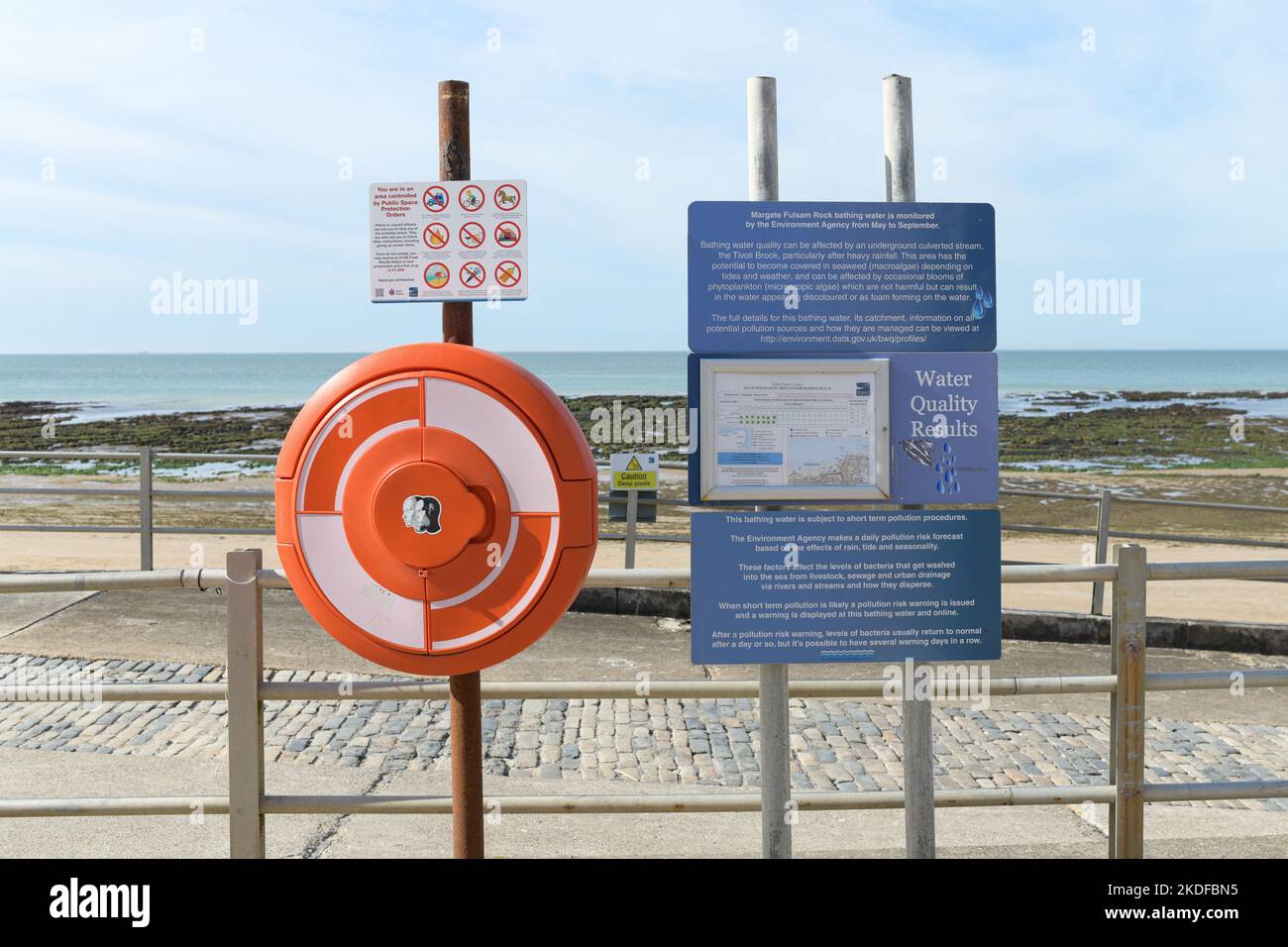 Fulsam Rock beach water quality results information board and life buoy lifesaver, Margate, Kent, England, UK Stock Photo