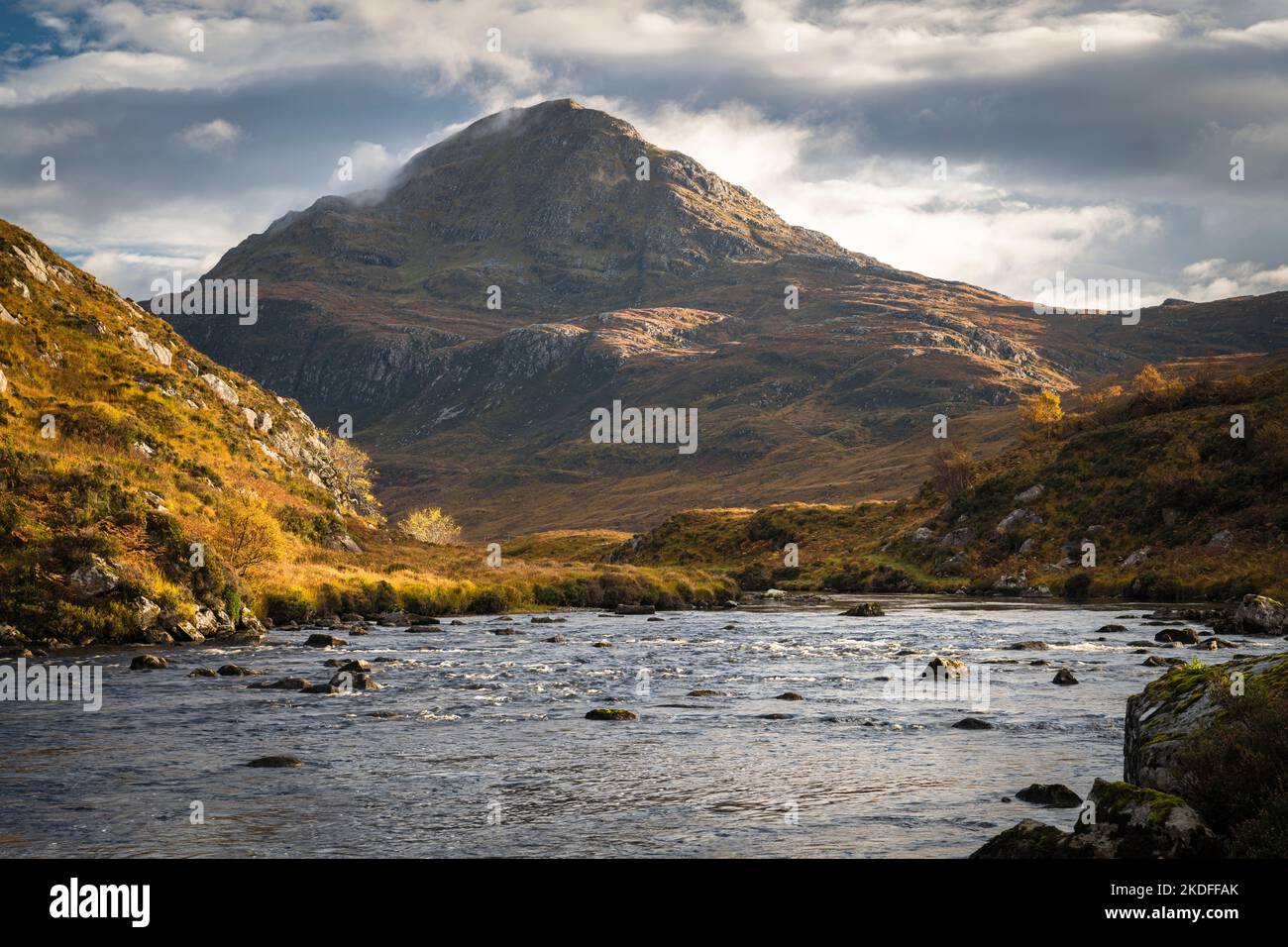 A bright, autumnal HDR image of Ben Stack and the River Stack in northwest Sutherland near Laxford Bridge, Scotland. 23 October 2022 Stock Photo