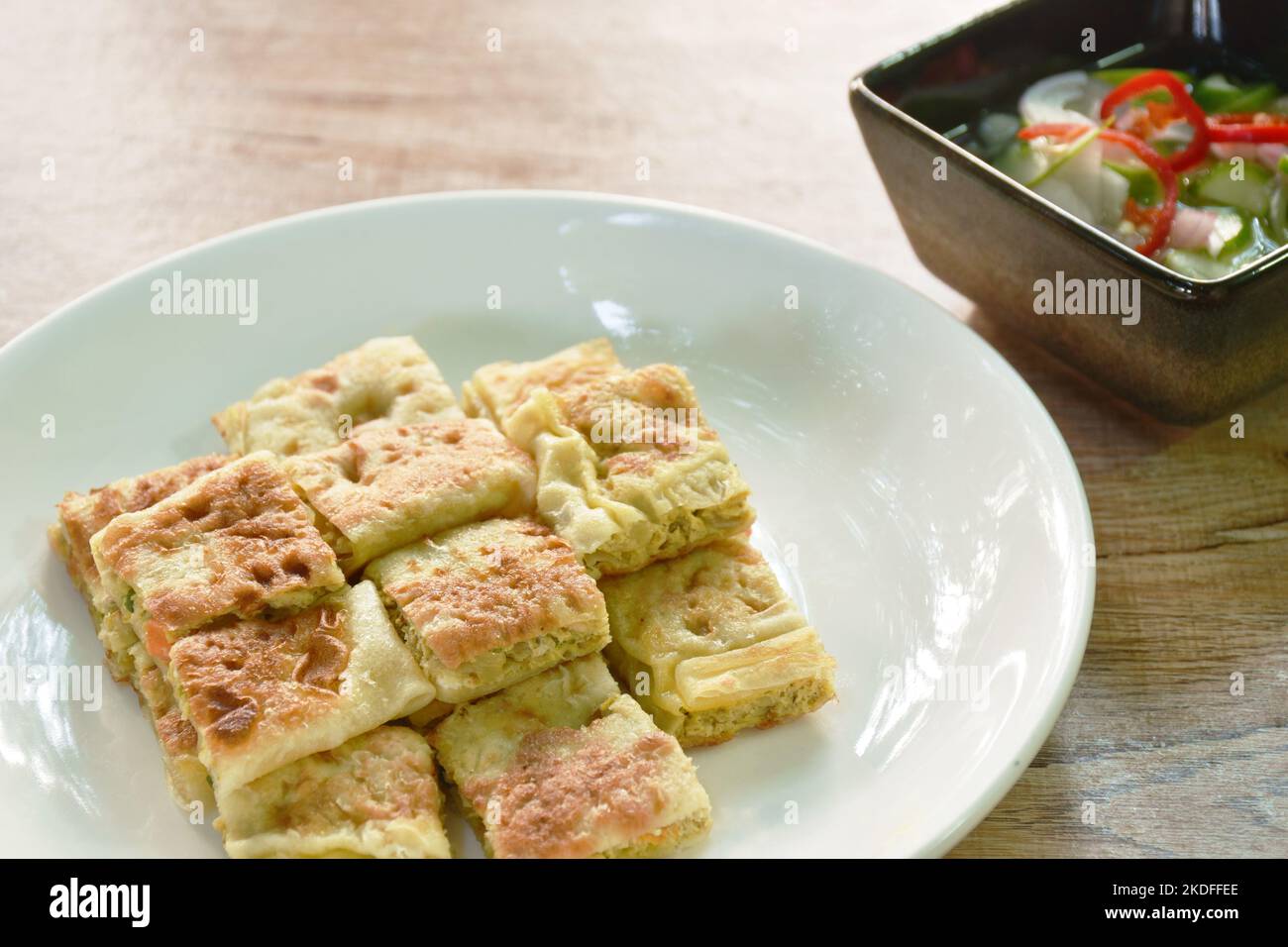 Stuffed Roti Chicken fried chicken Murtabak roti stuffed chicken on plate dipping sweet ...