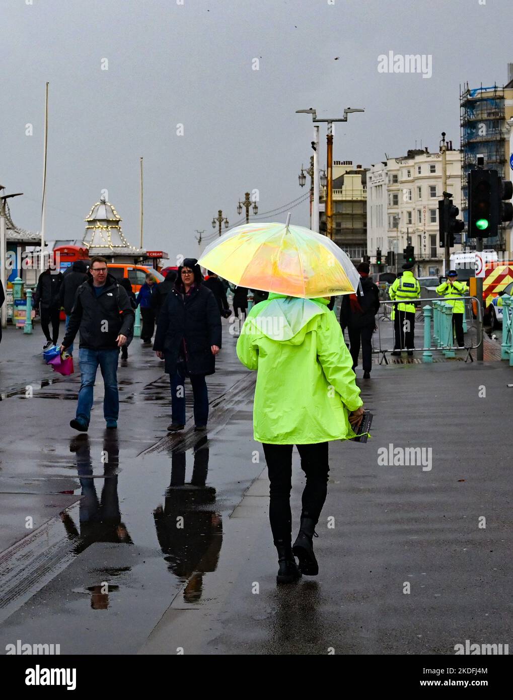 Brighton, UK. 6th Nov, 2022. Visitors brave the torrential rain and wind on Brighton seafront today as the recent stormy weather continues in the UK : Credit Simon Dack Credit: Simon Dack News/Alamy Live News Stock Photo
