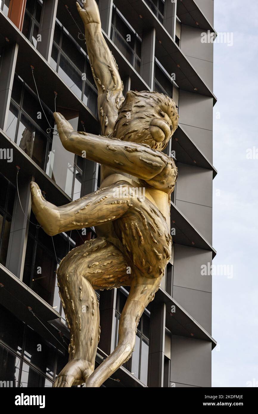 A golden monkey by Australian artist and ecologist Lisa Roet on the Lazada One office building Stock Photo