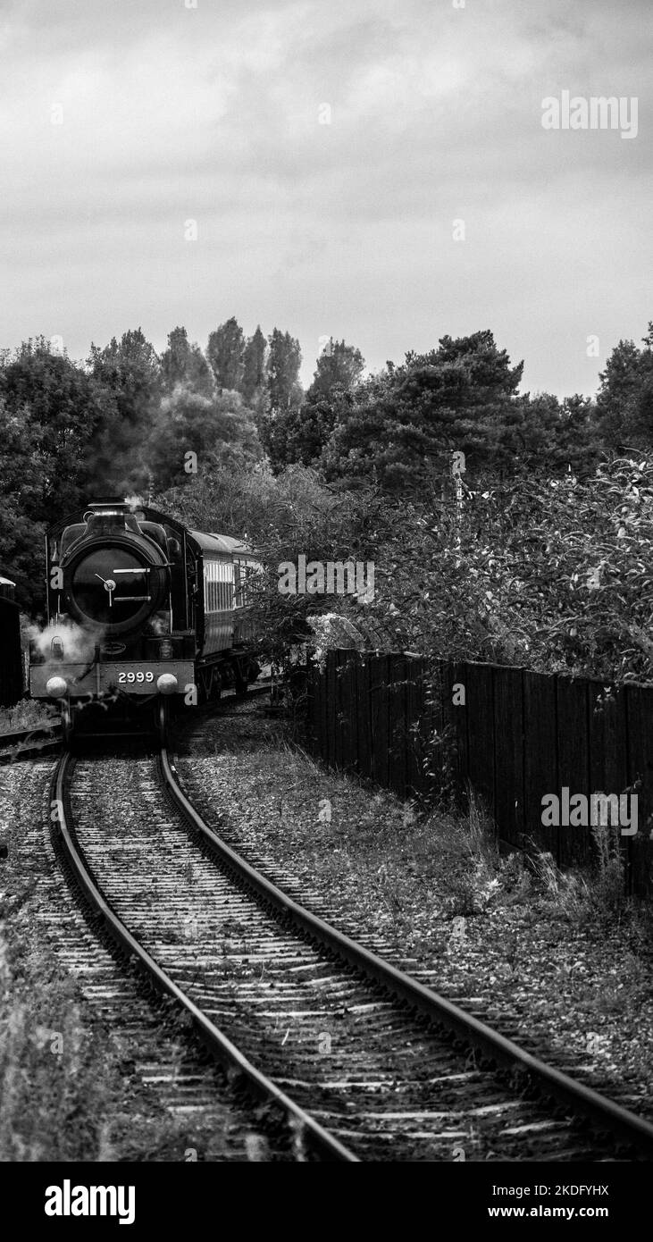 Black and white of steam railway arrival station Stock Photo