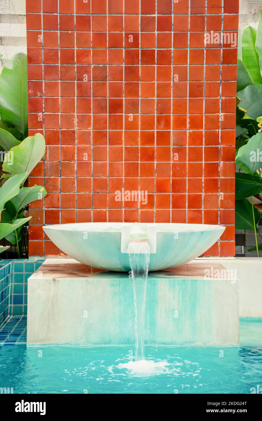 Waterfall jet at the swimming pool on daytime Stock Photo Alamy