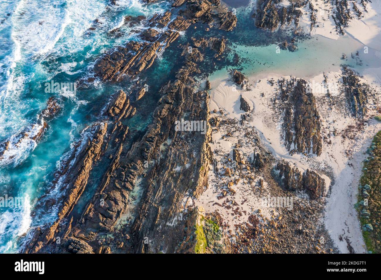 Drone aerial photograph of the rugged and rocky coastline of