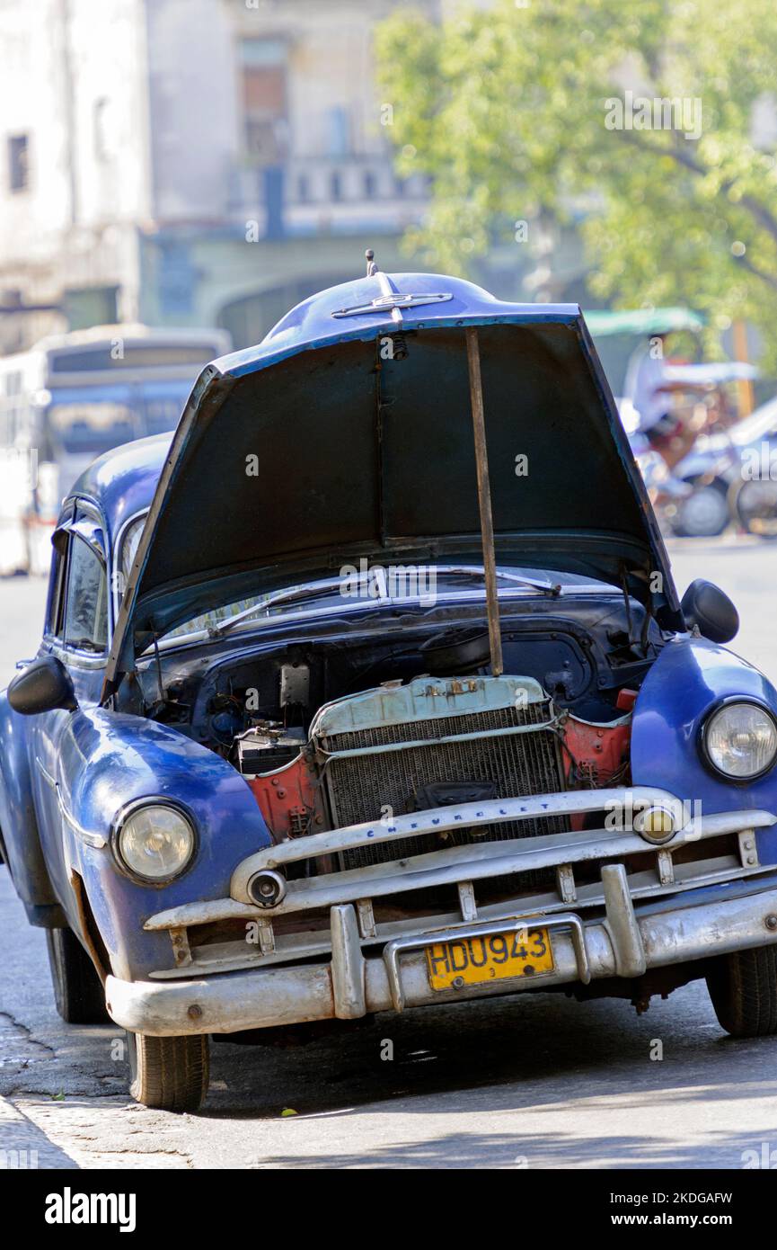 Vintage 1949 Chevrolet Deluxe Classic under repair on the streets of Havana Cuba Stock Photo