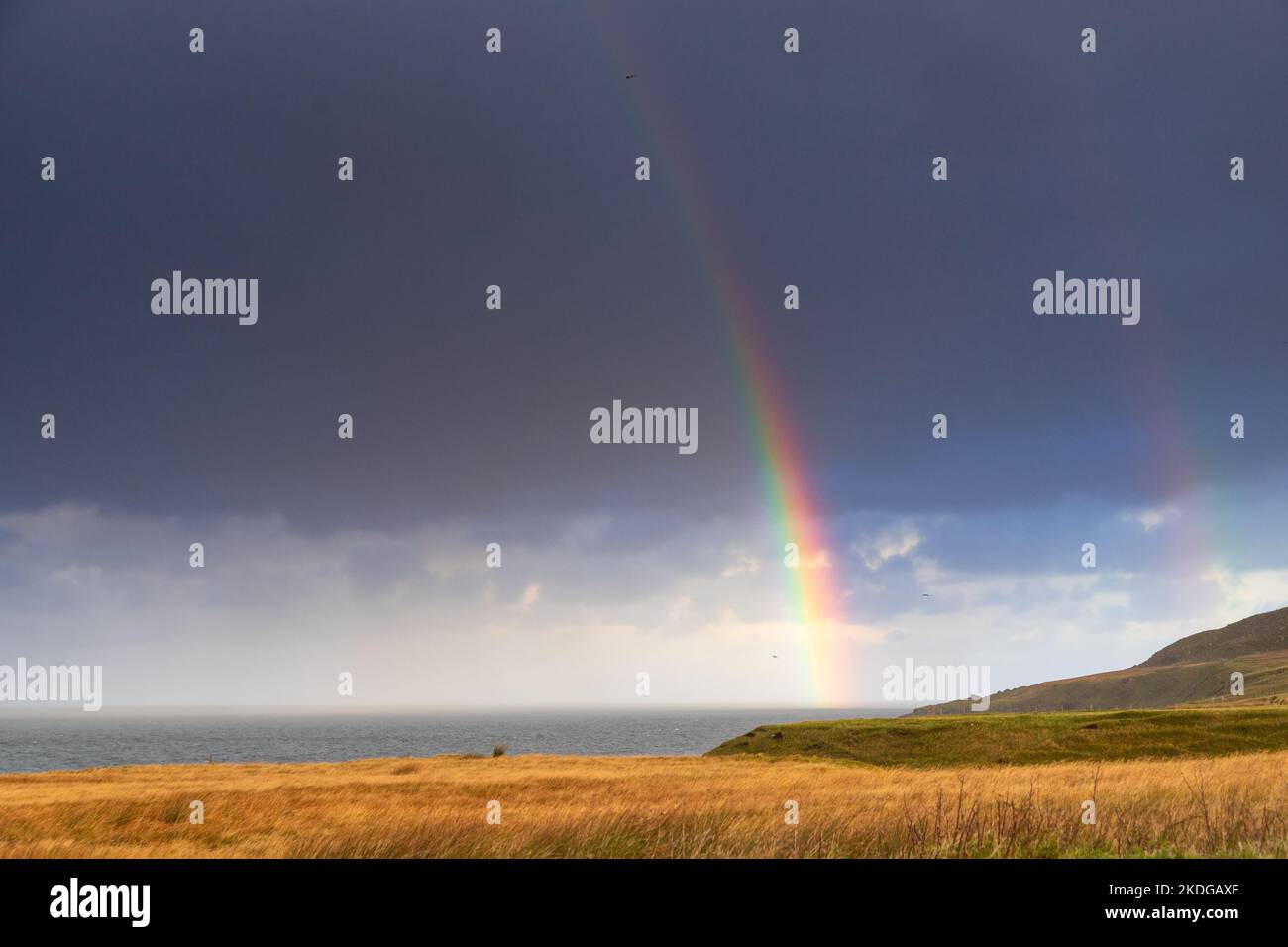 Rainbow over Aultgrishan on the Atlantic west coast of Scotland Stock Photo