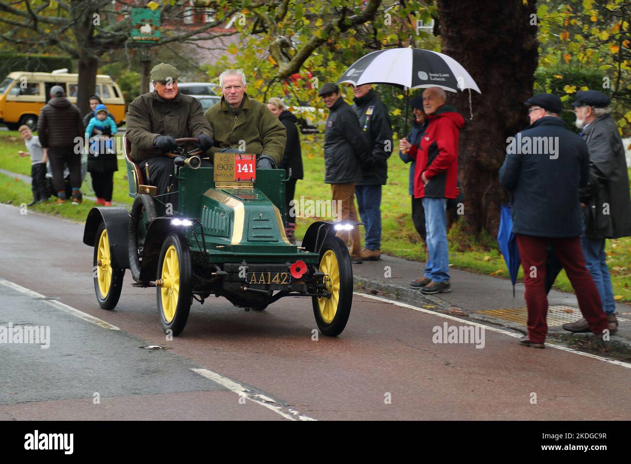 Staplefield, UK. 06th Nov, 2021. Participants battle the weather in their vintage vehicles during the historic London to Brighton Veteran Car Run. The run set off from Hyde Park in London at sunrise and makes its journey to Brighton on the Sussex coast. Credit: Uwe Deffner/Alamy Live News Stock Photo