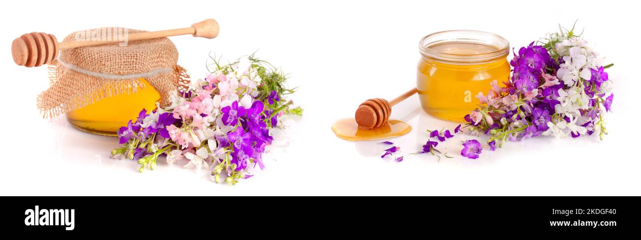 Jar of honey with wildflowers isolated on white background Stock Photo