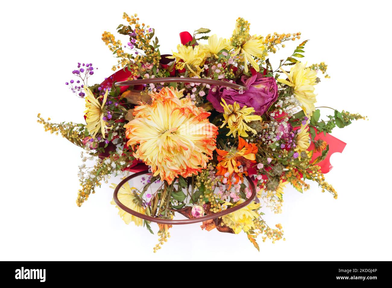 Old withered bouquet of asters, chrysanthemum and roses shot from above Stock Photo