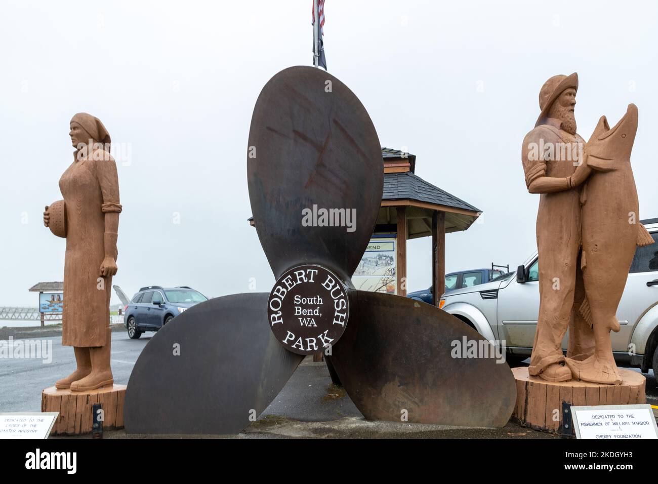 South Bend, WA. USA - 10-2022: Fishing Boat Propeller and Wood Carvings at Entrance to Robert Bush Park Stock Photo