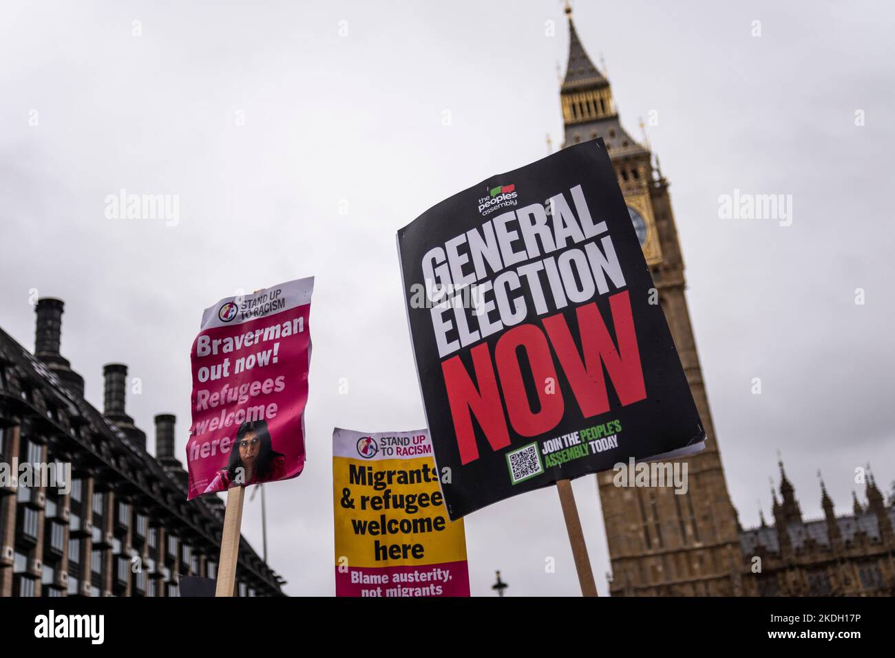 General election now sign at a protest in London against Conservative government austerity measures, calling for a general election and higher wages. Stock Photo