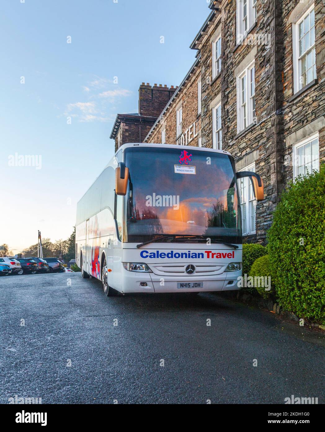 A Caledonian Travel coach outside the Windermere Hotel in the Lake District, England,UK Stock Photo