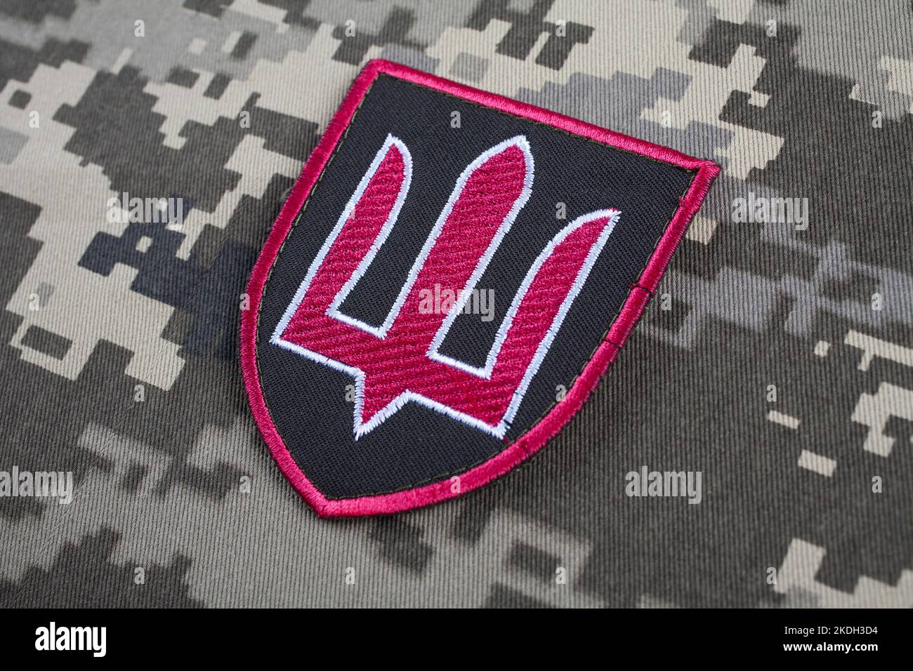 KYIV, UKRAINE - October 5, 2022. Russian invasion in Ukraine 2022. The Ministry of Defence of Ukraine uniform shoulder sleeve insignia badge on camouf Stock Photo