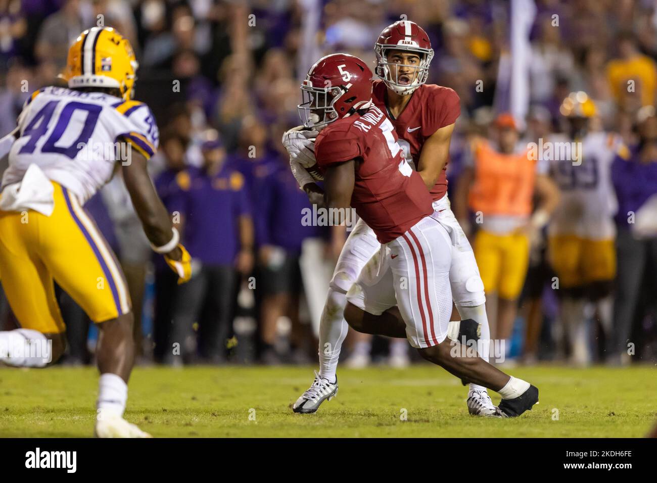 Alabama Crimson Tide quarterback Bryce Young (9) hands the ball off to running back Roydell Williams (5), Saturday, Nov. 5, 2022, in Baton Rouge, Loui Stock Photo