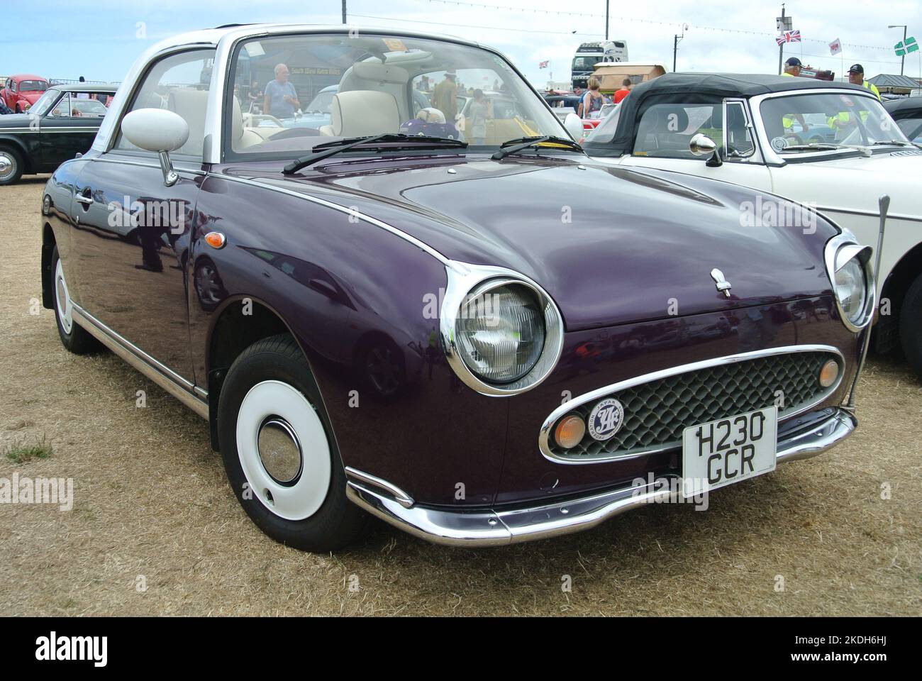 A 1991 Nissan Figaro parked on display at the English Riviera classic car show, Paignton, Devon, England, UK. Stock Photo