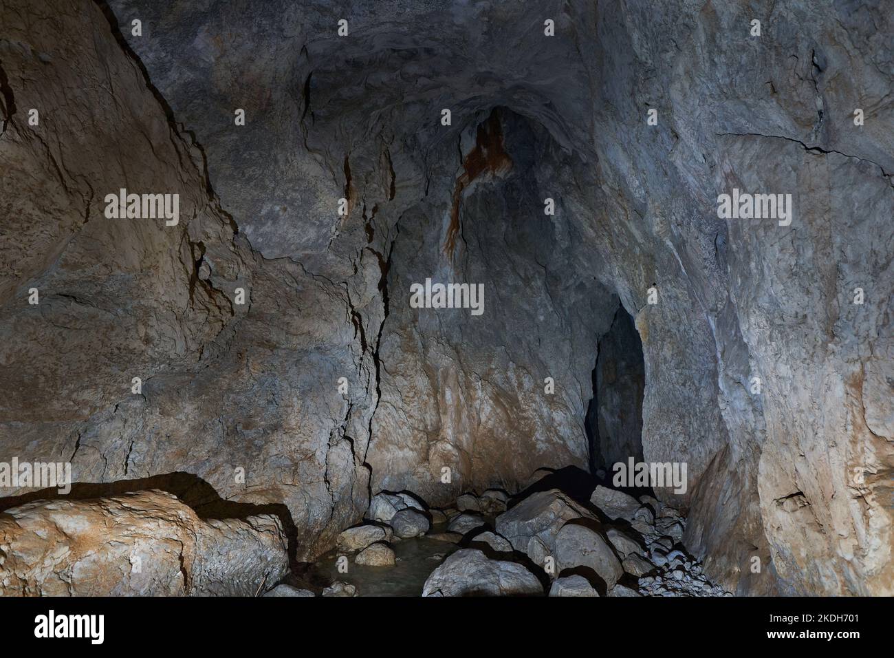 Huge cavern landscape of a natural cave in the limestone mountains ...