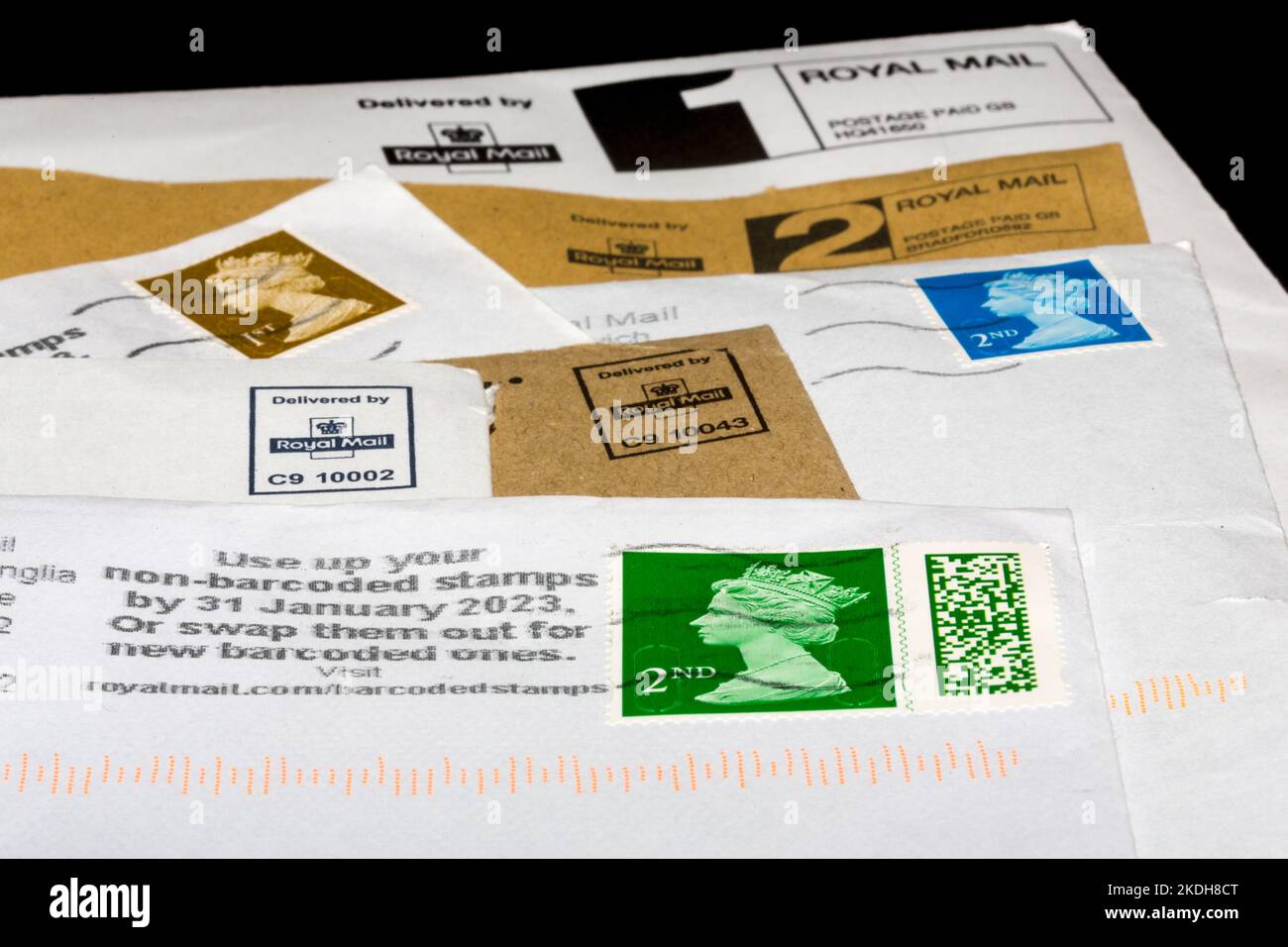 Royal mail postage stamps on stamped and franked letters. Stock Photo