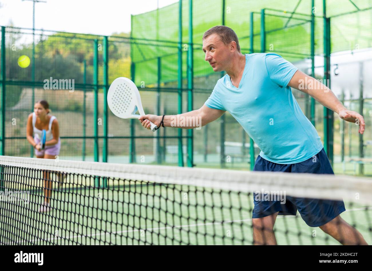 European man padel tennis player trains on the court Stock Photo Alamy