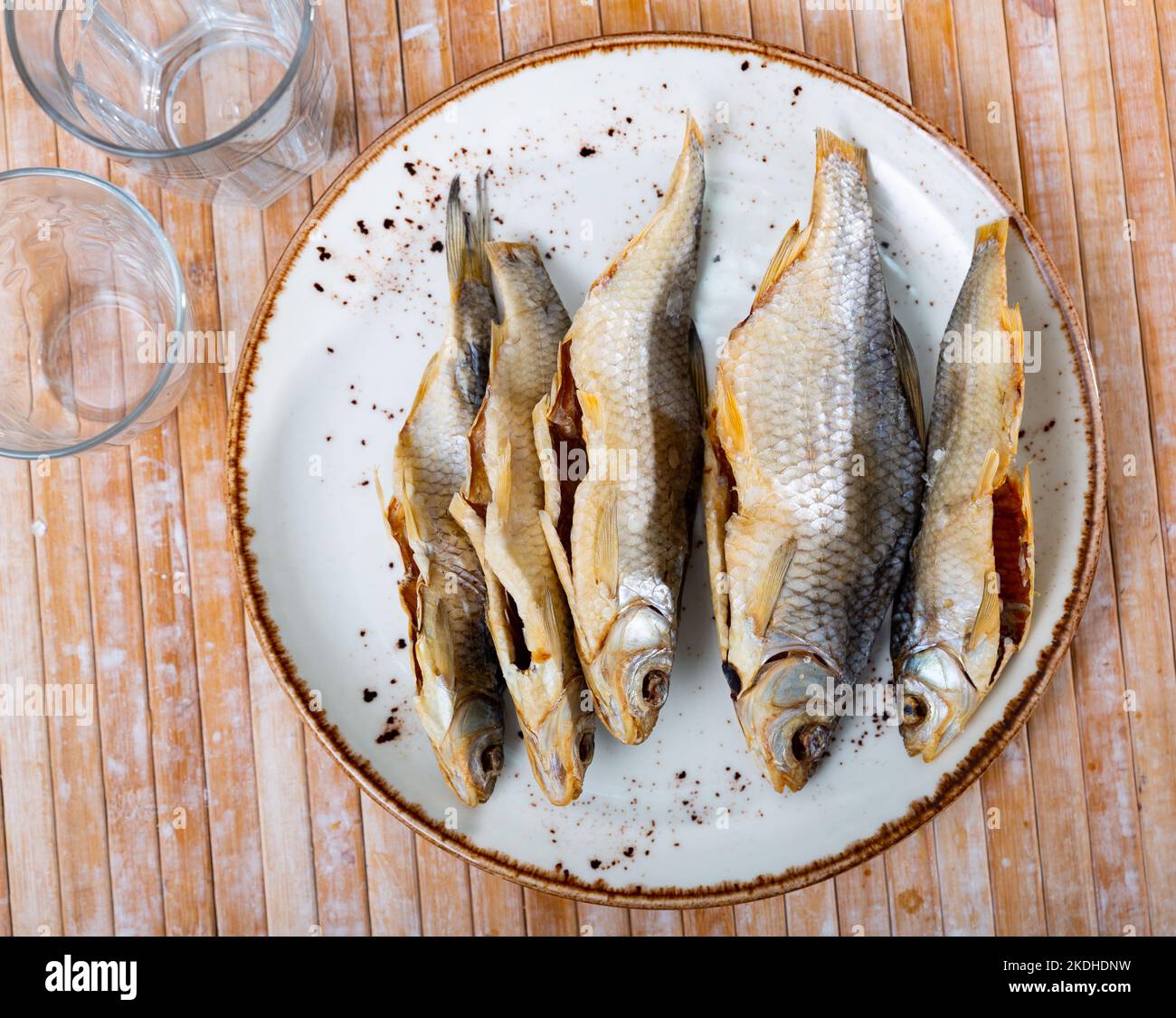 Dried roaches served on wooden table Stock Photo