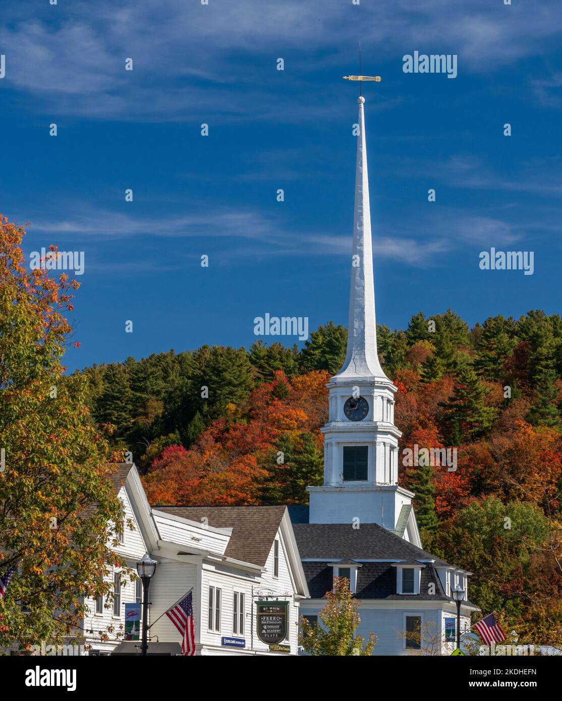 Stowe, VT - 6 October 2022: Steeple of Stowe Community Church set against fall colors Stock Photo