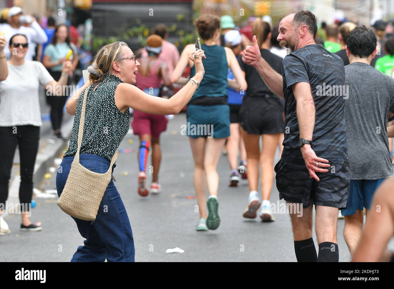 Spectators cheer on runners at the 2022 TCS New York City Marathon on
