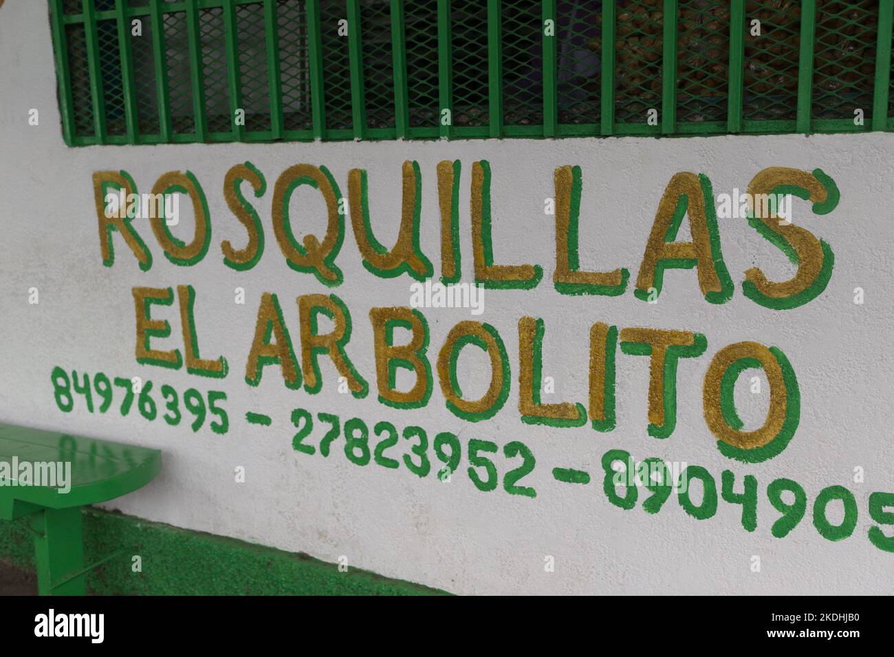 The wall sign for a rosquilla bakery.  Rosquillas are corn masa and lard cookies, very popular in Nicaragua.  The original Spanish meant donut. Stock Photo