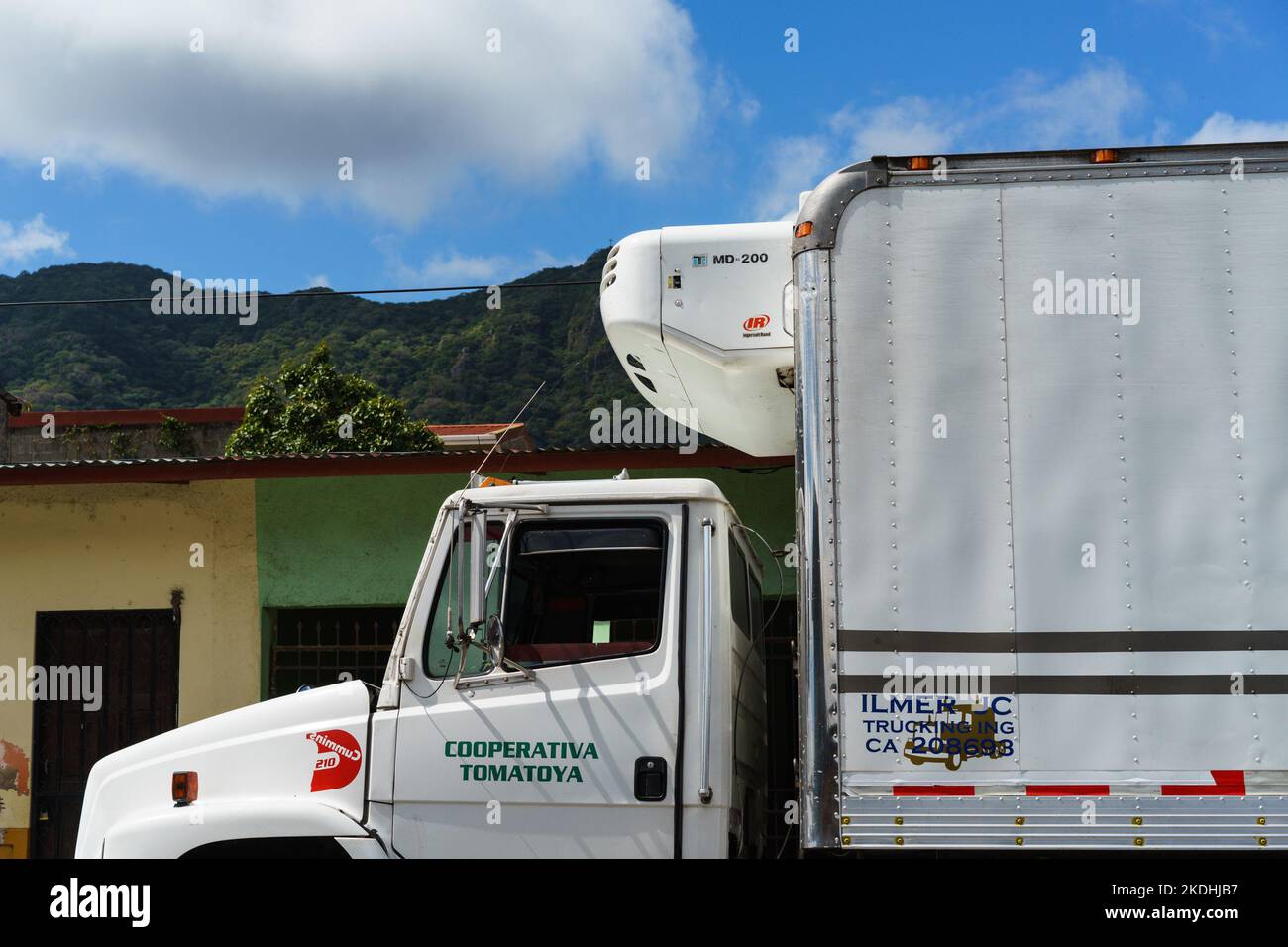 Chiller 18-wheeler truck from the Tomatoya agricultural cooperative parked to deliver food to a store in Jinotega, Nicaragua. Stock Photo