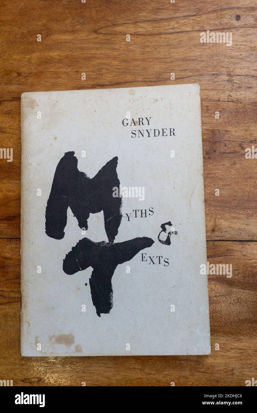 Front cover of Gary Snyder's MYTHS AND TEXTS on a wooden table. Stock Photo