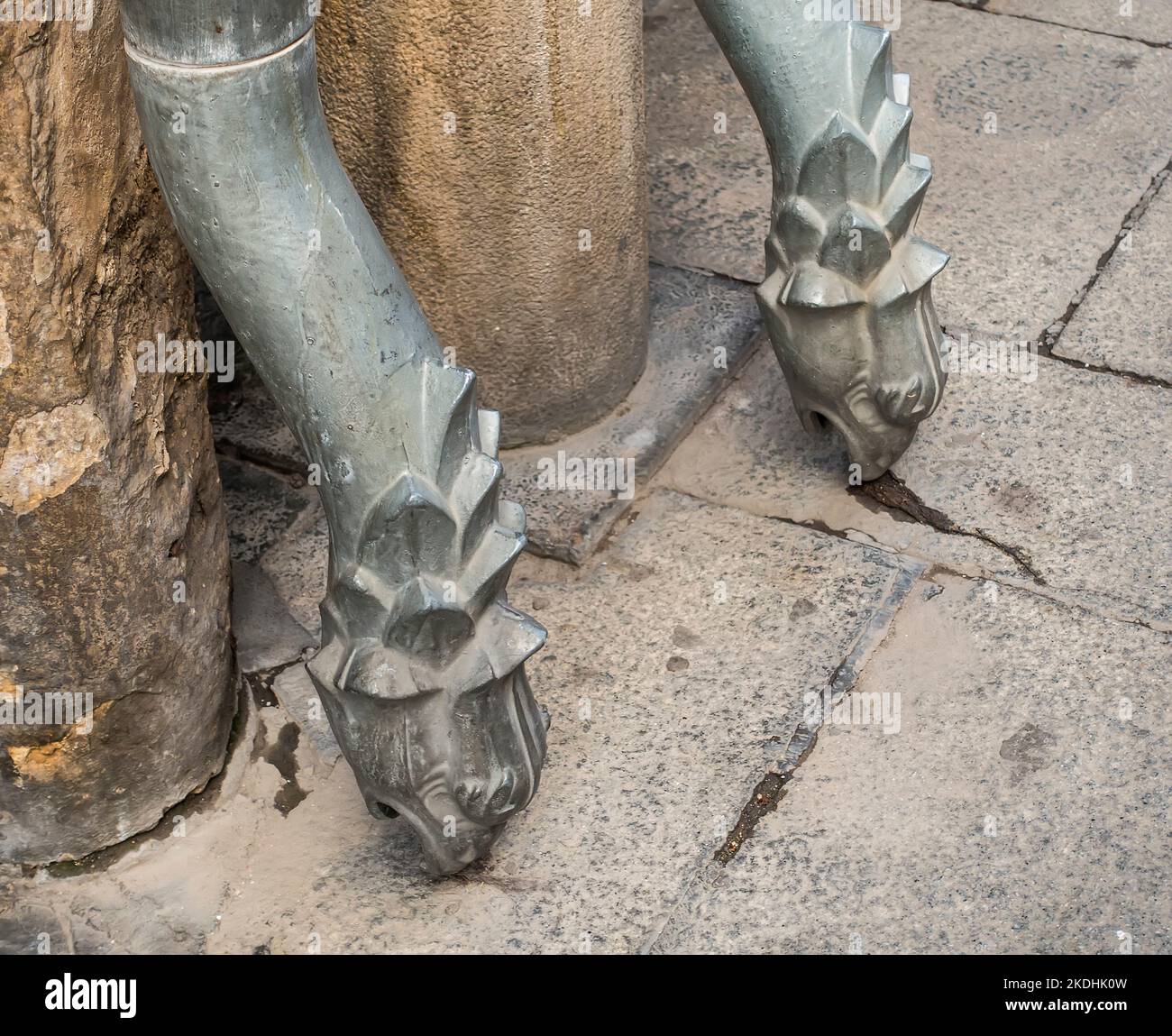 Drainpipe dragon heads in Alcala de Henares, Spain Stock Photo