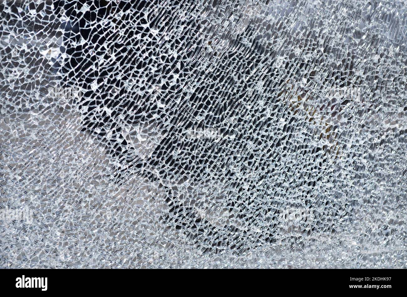 Broken glass texture, full frame. Can be used as an abstract background with copy space. Stock Photo