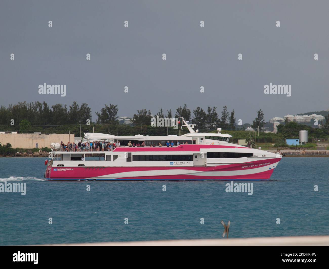 Large ferry entering St. George's harbor in Bermuda. This ferry is provided by the Norwegian Cruise Line for passenger connivence. Stock Photo