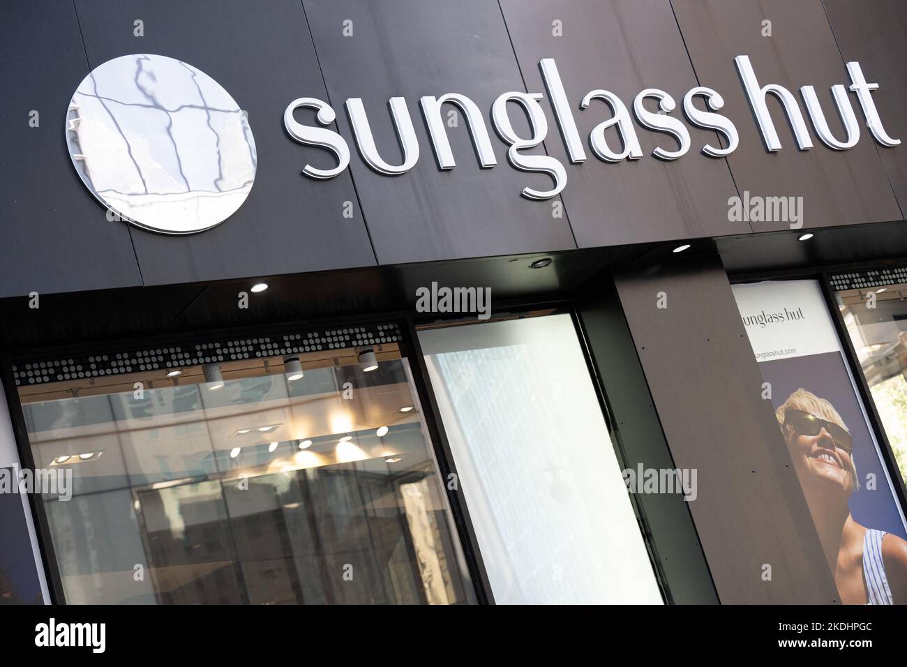 A shop sign of SUNGLASS HUT, on November 5, 2022 in New York City, USA. Photo by David Niviere