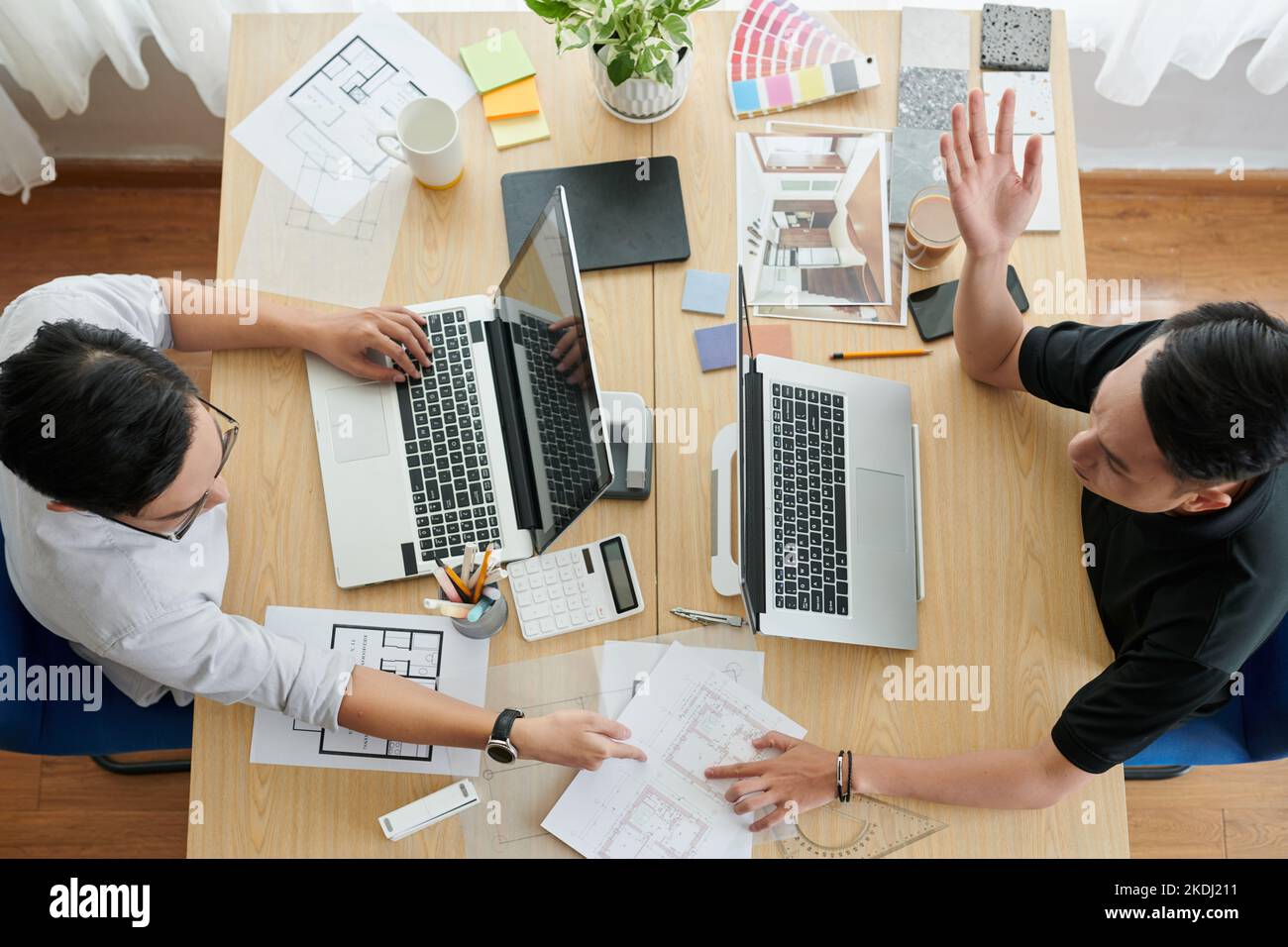 Business team brainstorming discussing working hi-res stock photography ...