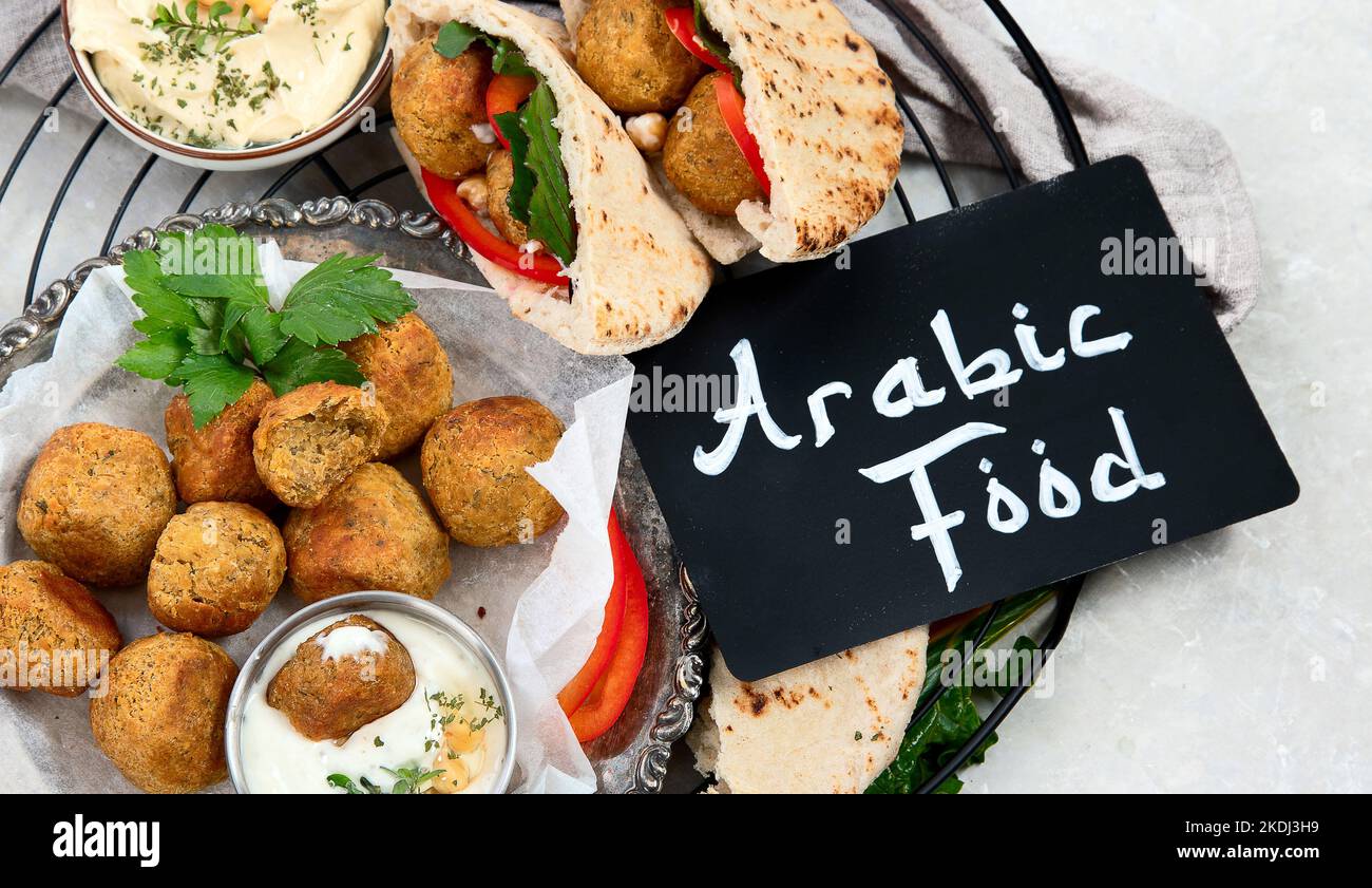 Middle eastern, arabic dishes with falafel, hummus, pita. Halal food