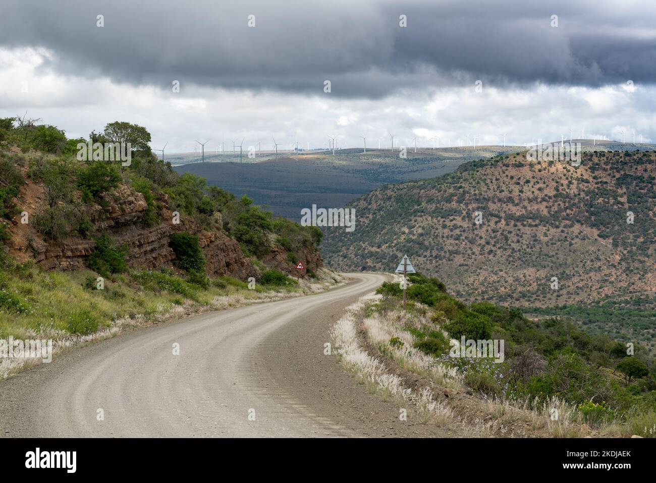 Wind turbines viewed from a dirt road through farmland near the village of Bedford, Eastern Cape, South Africa, 2022. Stock Photo