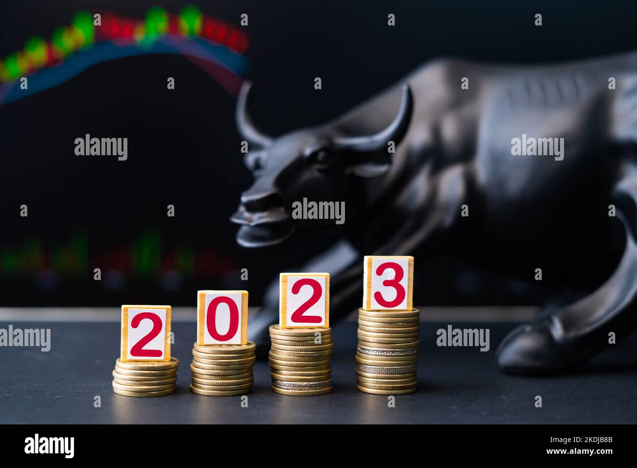 Concept showing of 2023 bullish stock market by placing coins in increasing order with running stock market charts Stock Photo