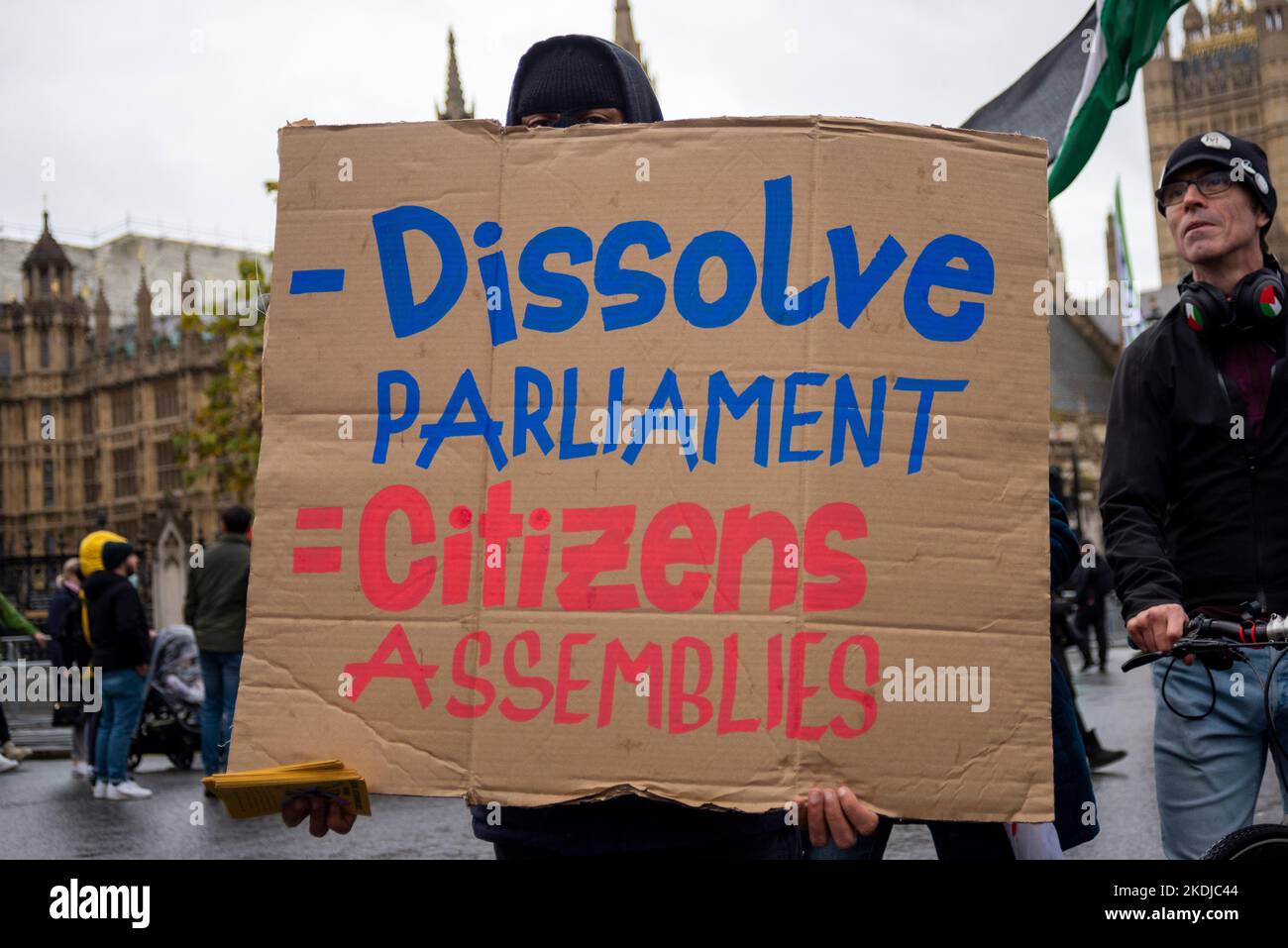 Dissolve Parliament sign at a protest in London against Conservative government austerity measures, calling for a general election and higher wages. Stock Photo