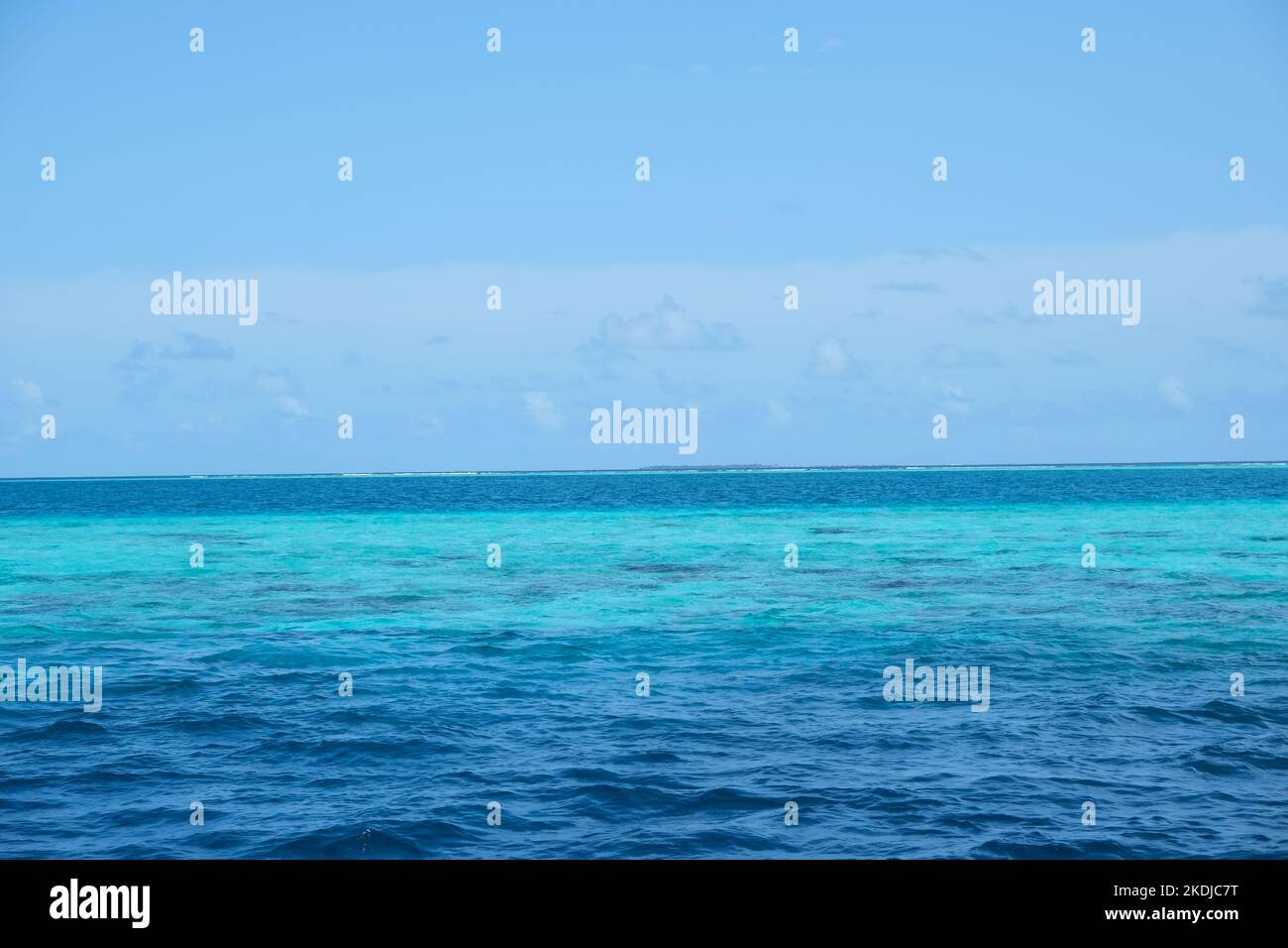 Beautiful gradient colour of seawater at Baa atoll, Maldives, during hot afternoon. Stock Photo