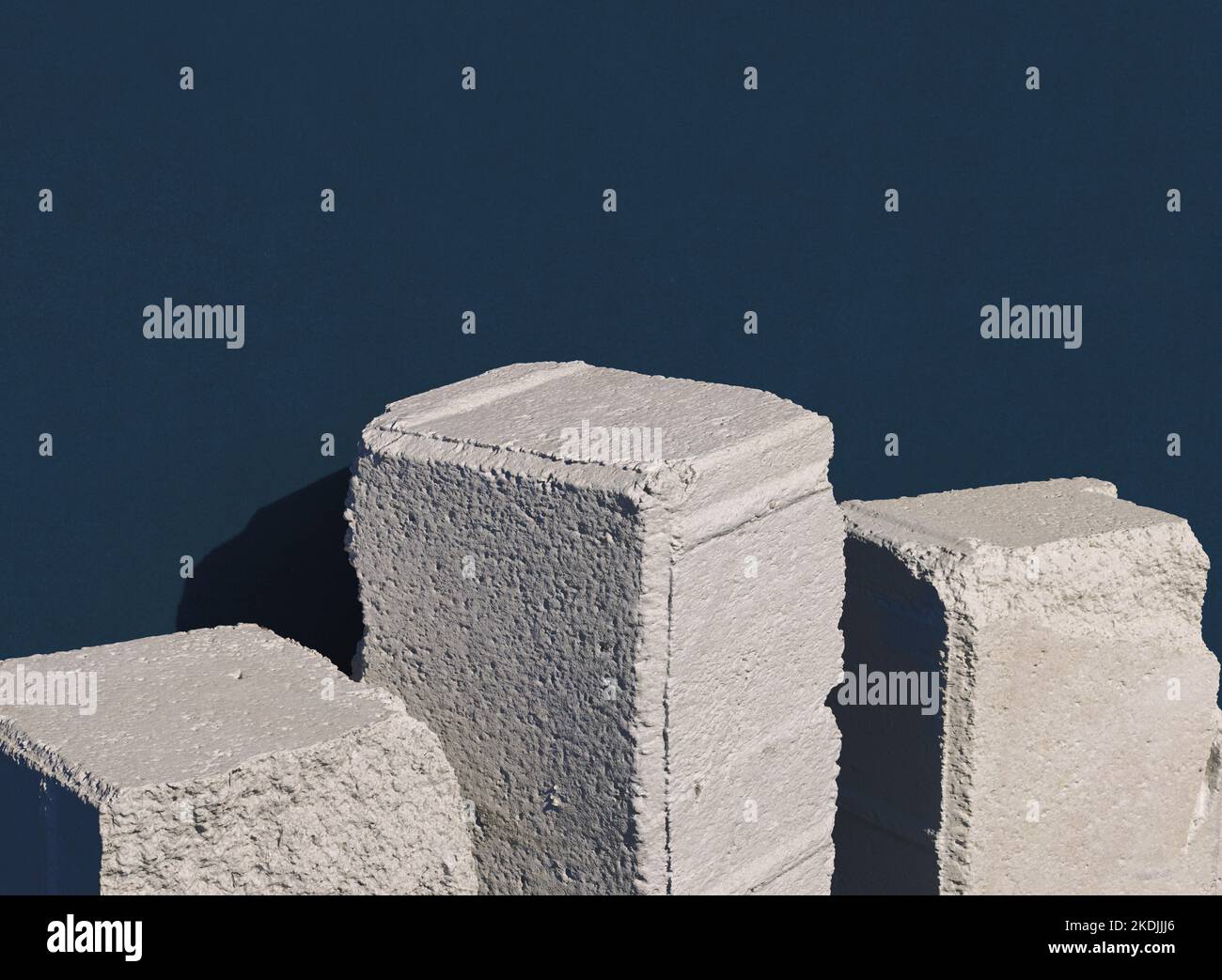 Old stone blocks in row against dark blue background. 3d computer ...
