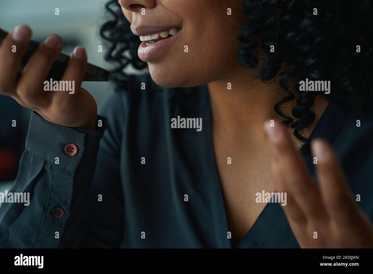 Young black woman talks on hi-res stock photography and images - Alamy