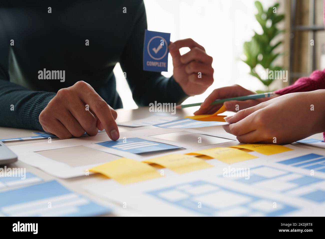 Group of ux developer and ui designer brainstorming about app interface ...