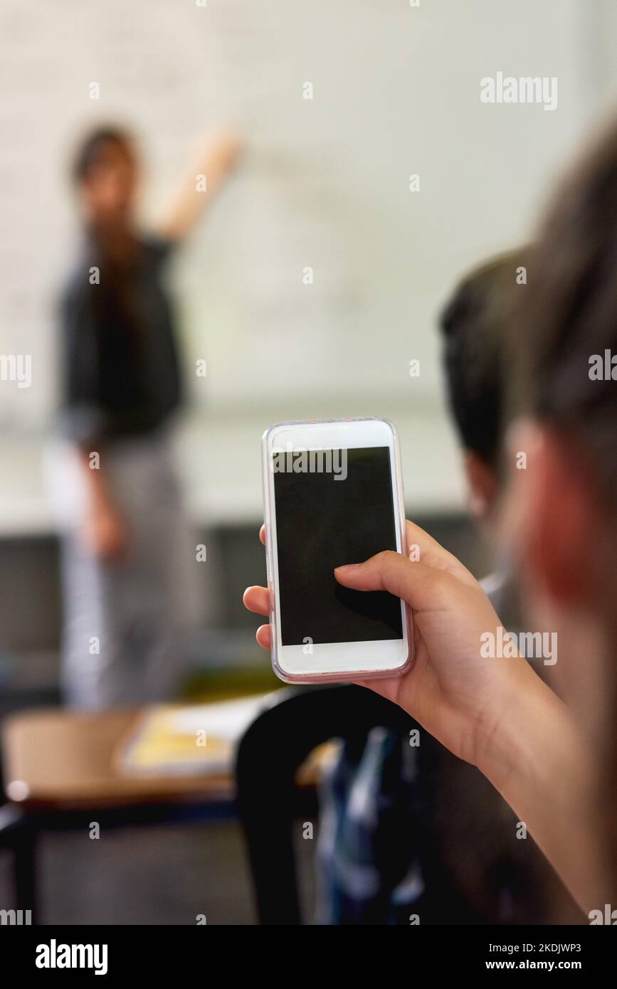 Smartphones are a source of constant distraction. an unidentifiable