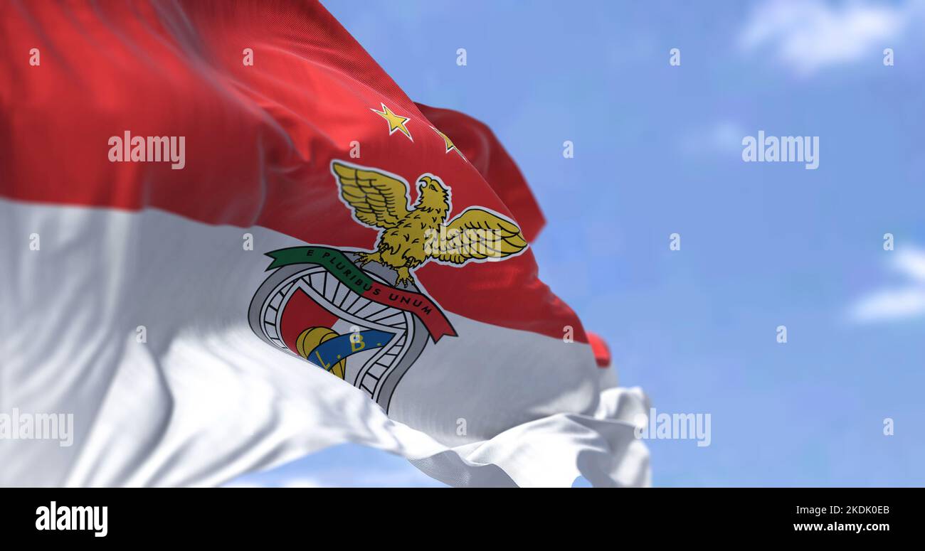 Lisbon, PT, Oct. 2022: The flag of SLB Benfica waving in the wind. Benfica is a Portuguese sports club based in Lisbon, Portugal, in the province of S Stock Photo
