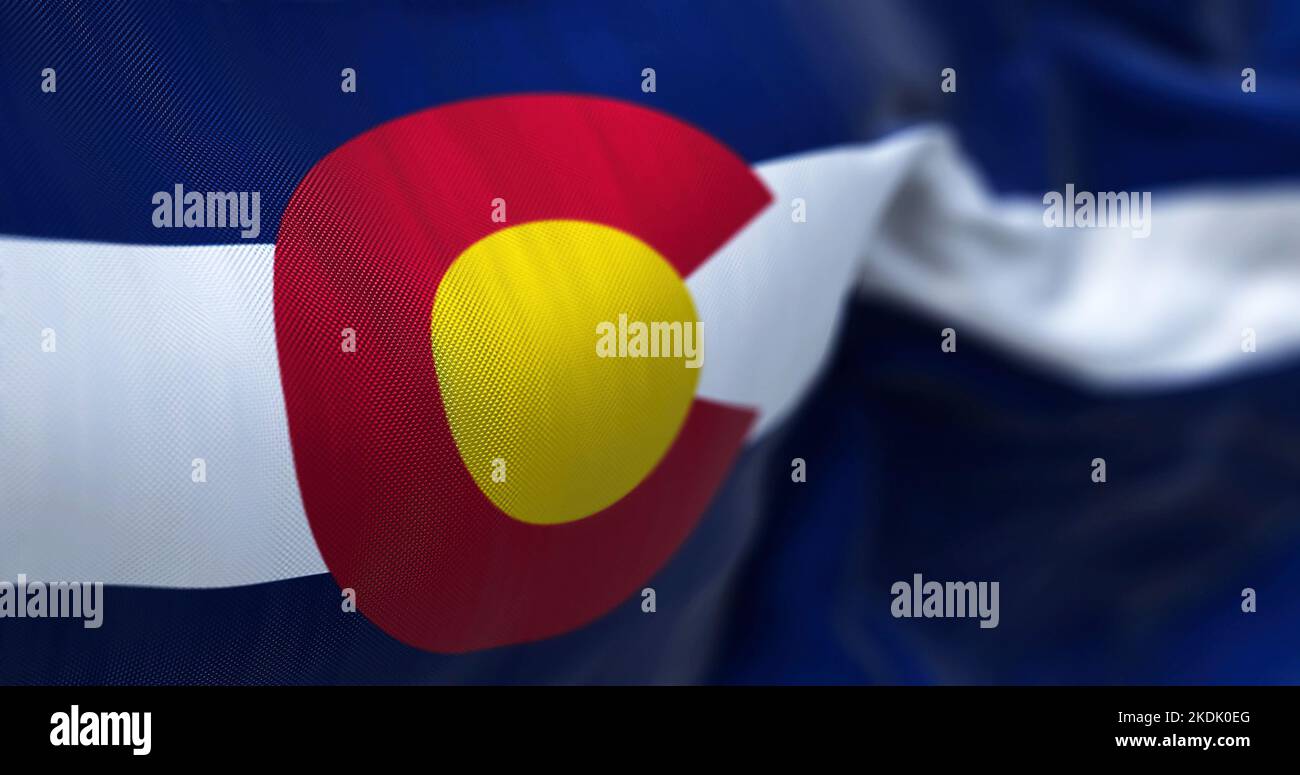 Closeup view of the Colorado state flag waving. Colorado is a United