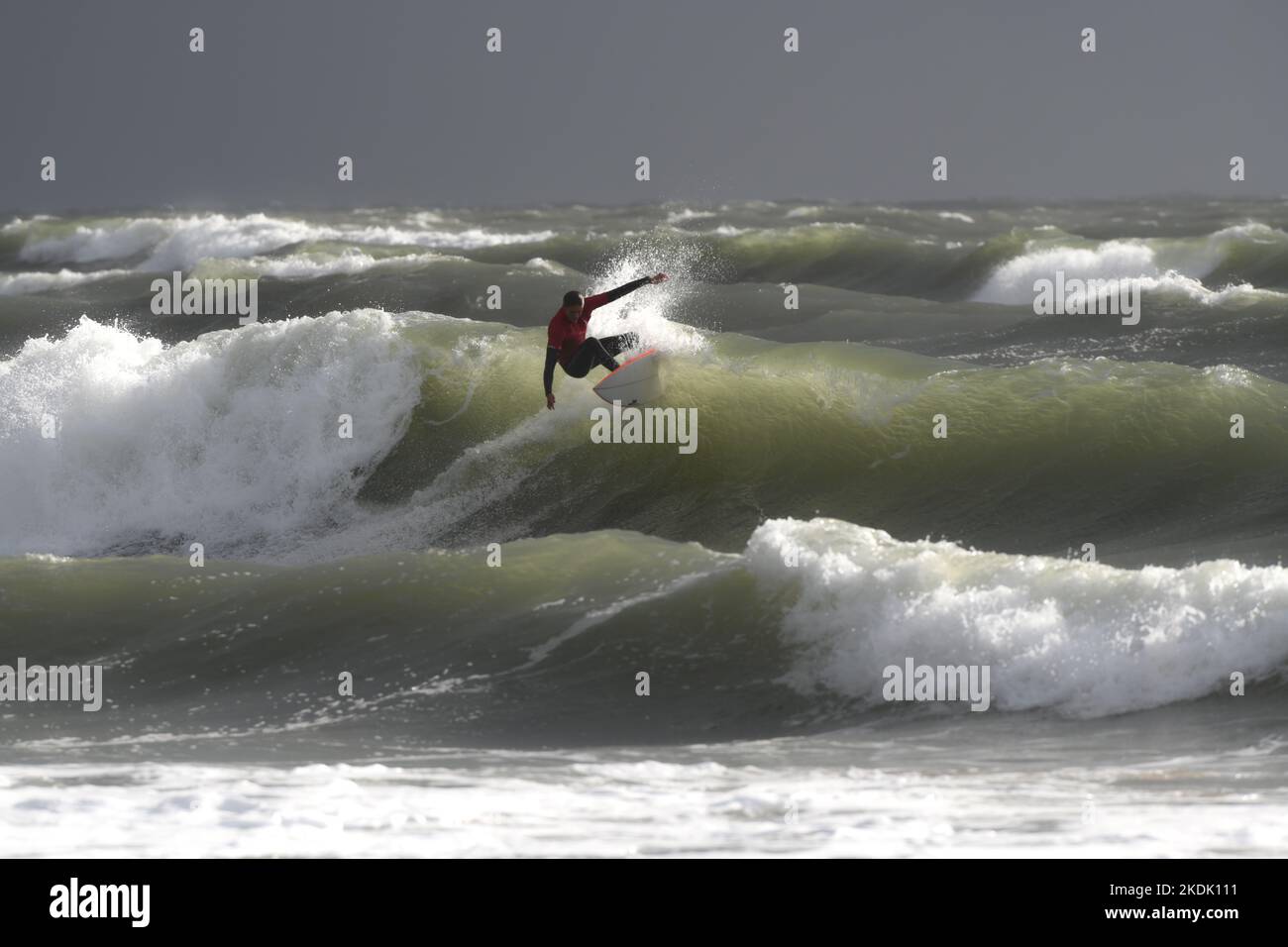 Autumn storm brings the waves rolling in for a local surf contest at Langland Bay, Mumbles, Swansea, Gower Stock Photo