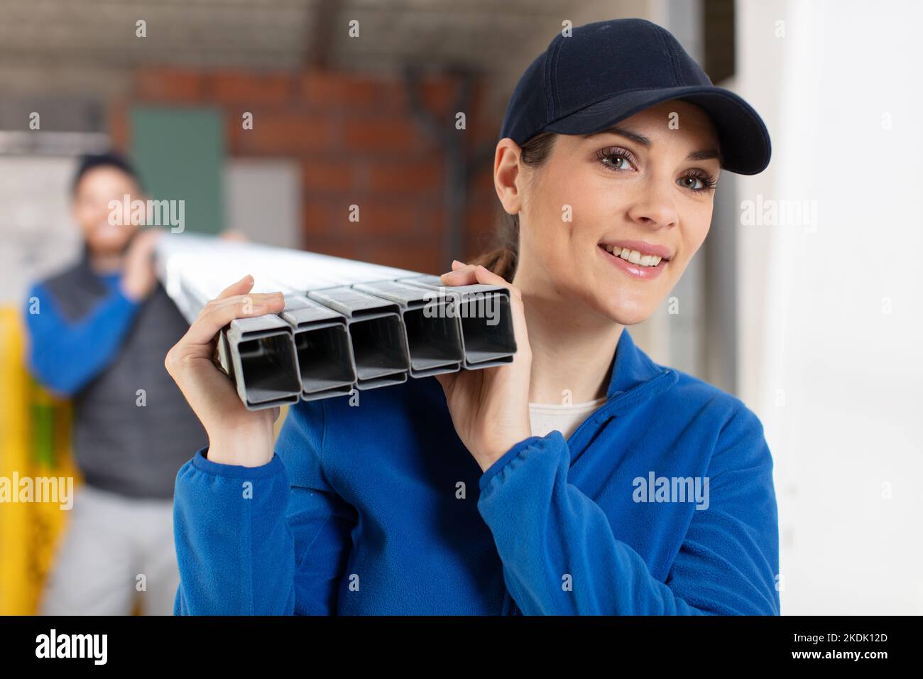 female builder looking at camera Stock Photo