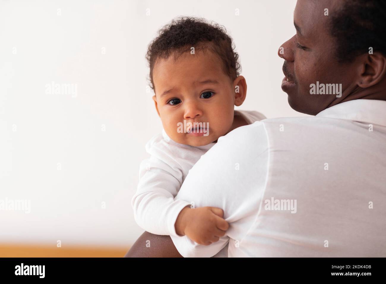 African father and son holding hands hi-res stock photography and ...