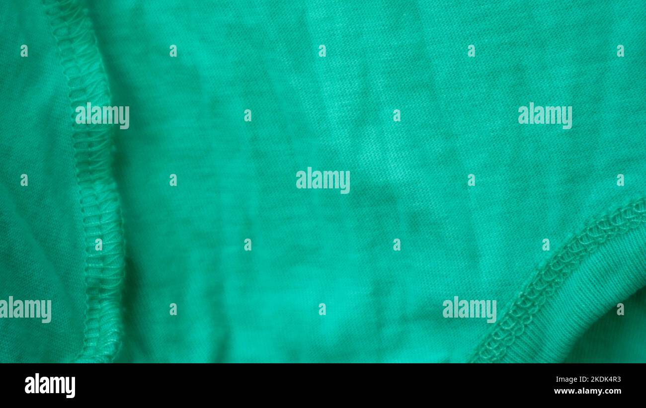 green fabric texture as background Stock Photo - Alamy