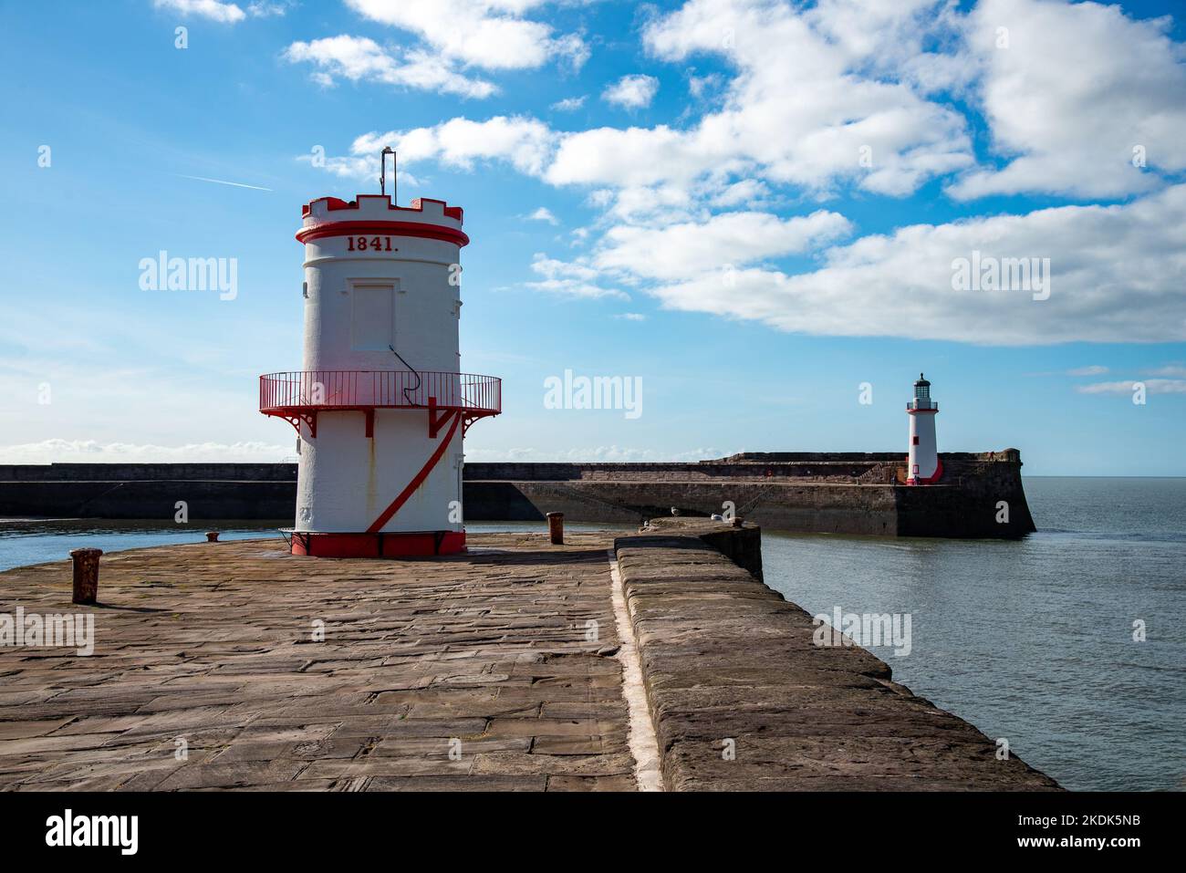 North Pier lighthouse and West Pier lighthouse, Whitehaven, Cumbria, UK Stock Photo